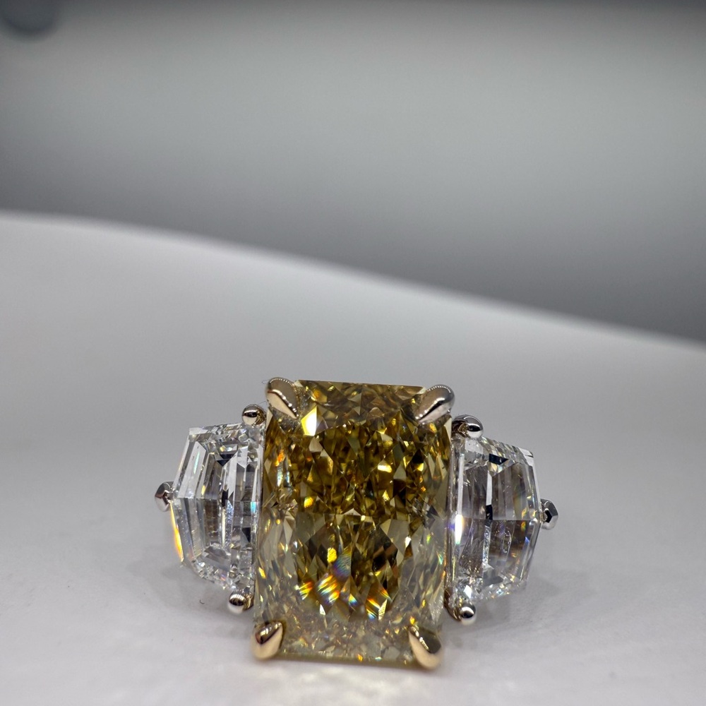 4.01 carat fancy intense yellow VS1 radiant lab diamond with Cadillac engagement